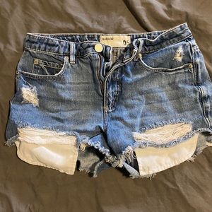 Distressed blue Jean shorts